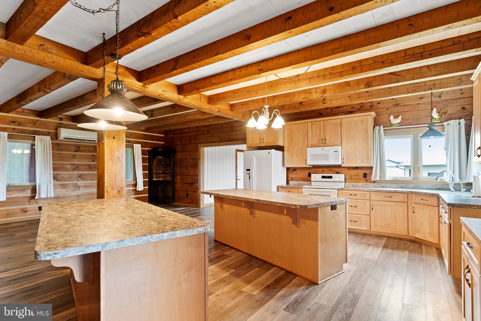 729 Gloss Road East Waterford, PA 17021 - Photo 24 of 70 a kitchen with stainless steel appliances granite countertop a sink stove and cabinets