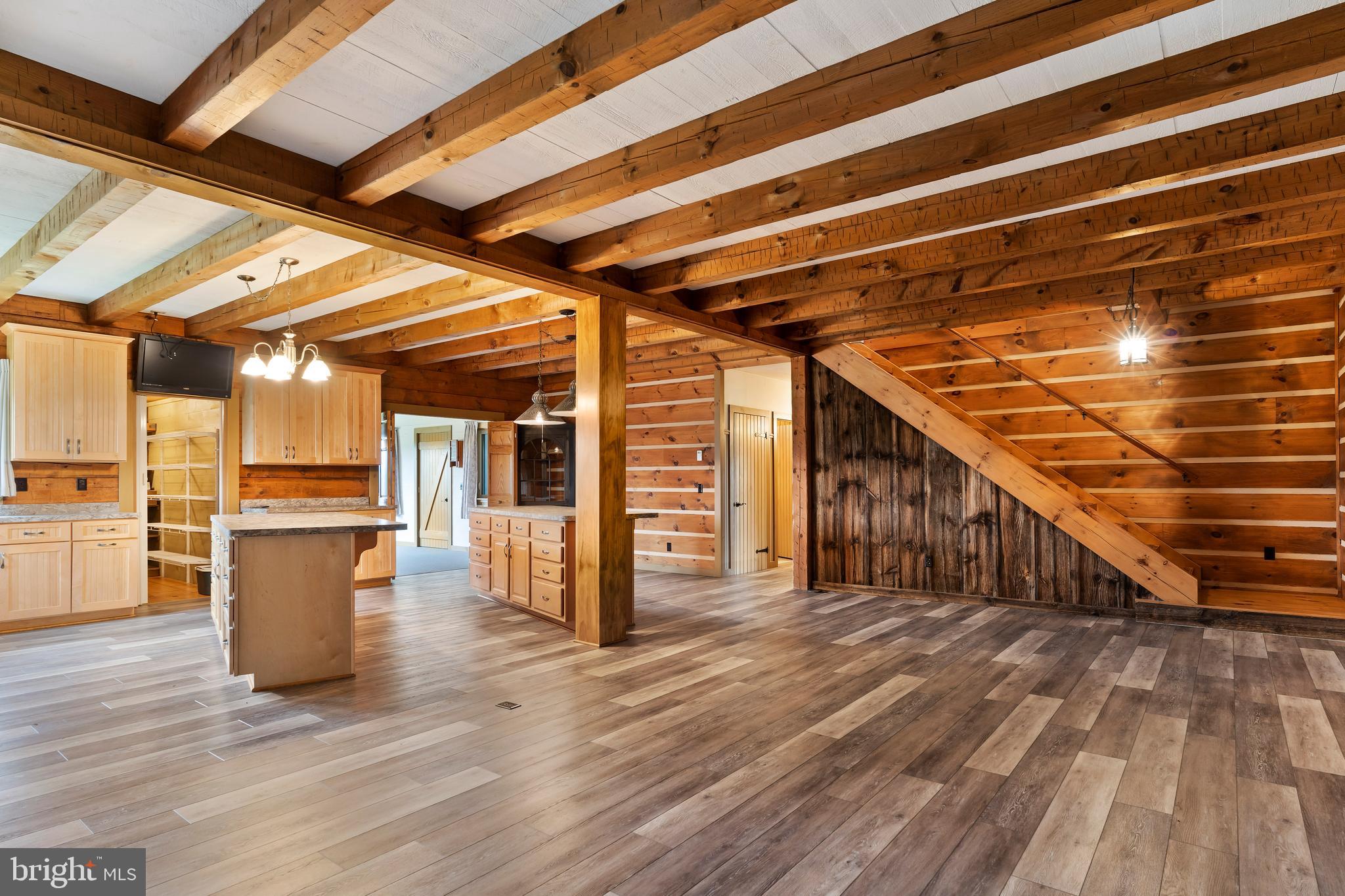729 Gloss Road East Waterford, PA 17021 - Photo 27 of 70 a view of a hallway with wooden floor