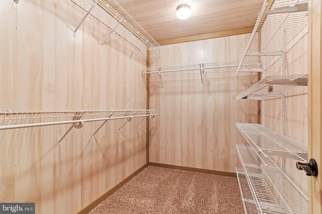 a view of a room that has a large window