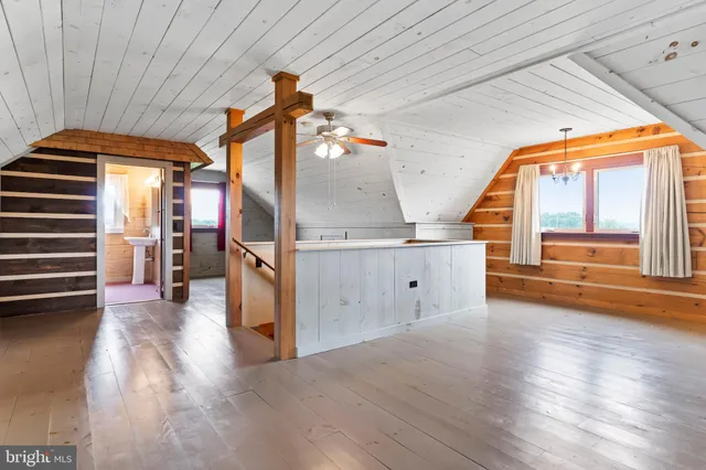 a view of storage and utility room with washer and dryer