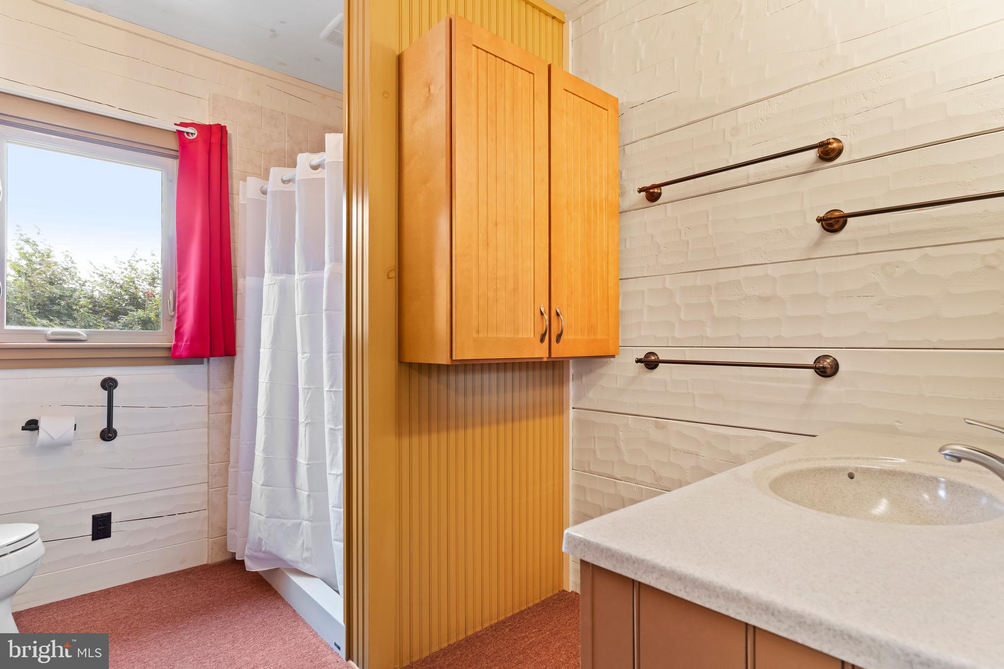 729 Gloss Road East Waterford, PA 17021 - Photo 43 of 70 a bathroom with a sink and a mirror