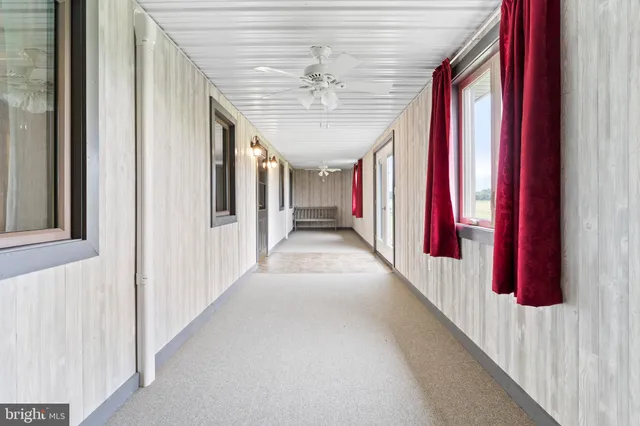a view of a room with wooden deck