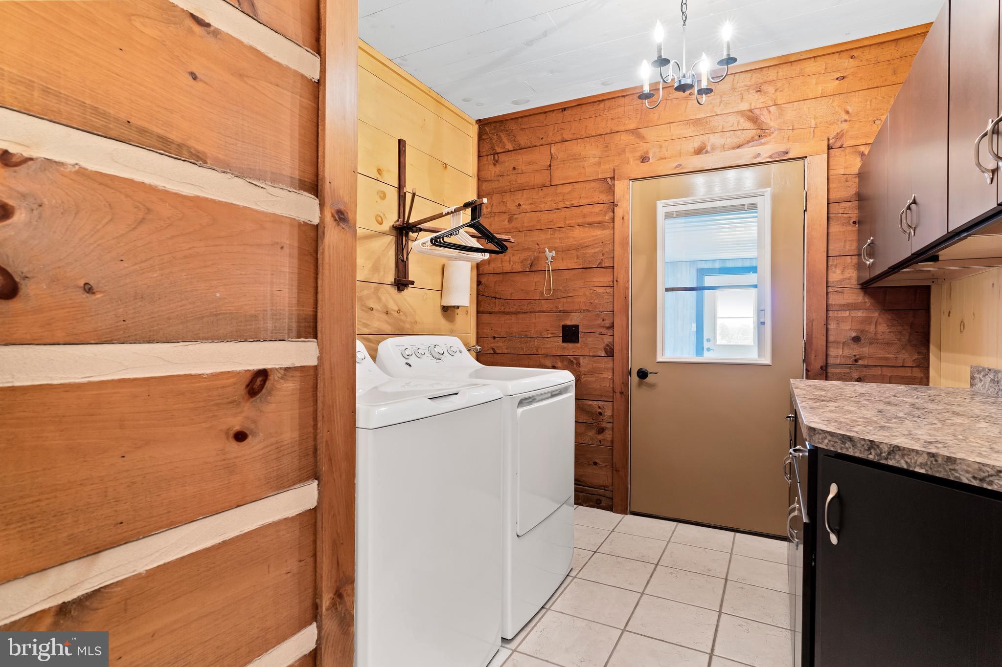 729 Gloss Road East Waterford, PA 17021 - Photo 48 of 70 a view of storage and utility room with washer and dryer