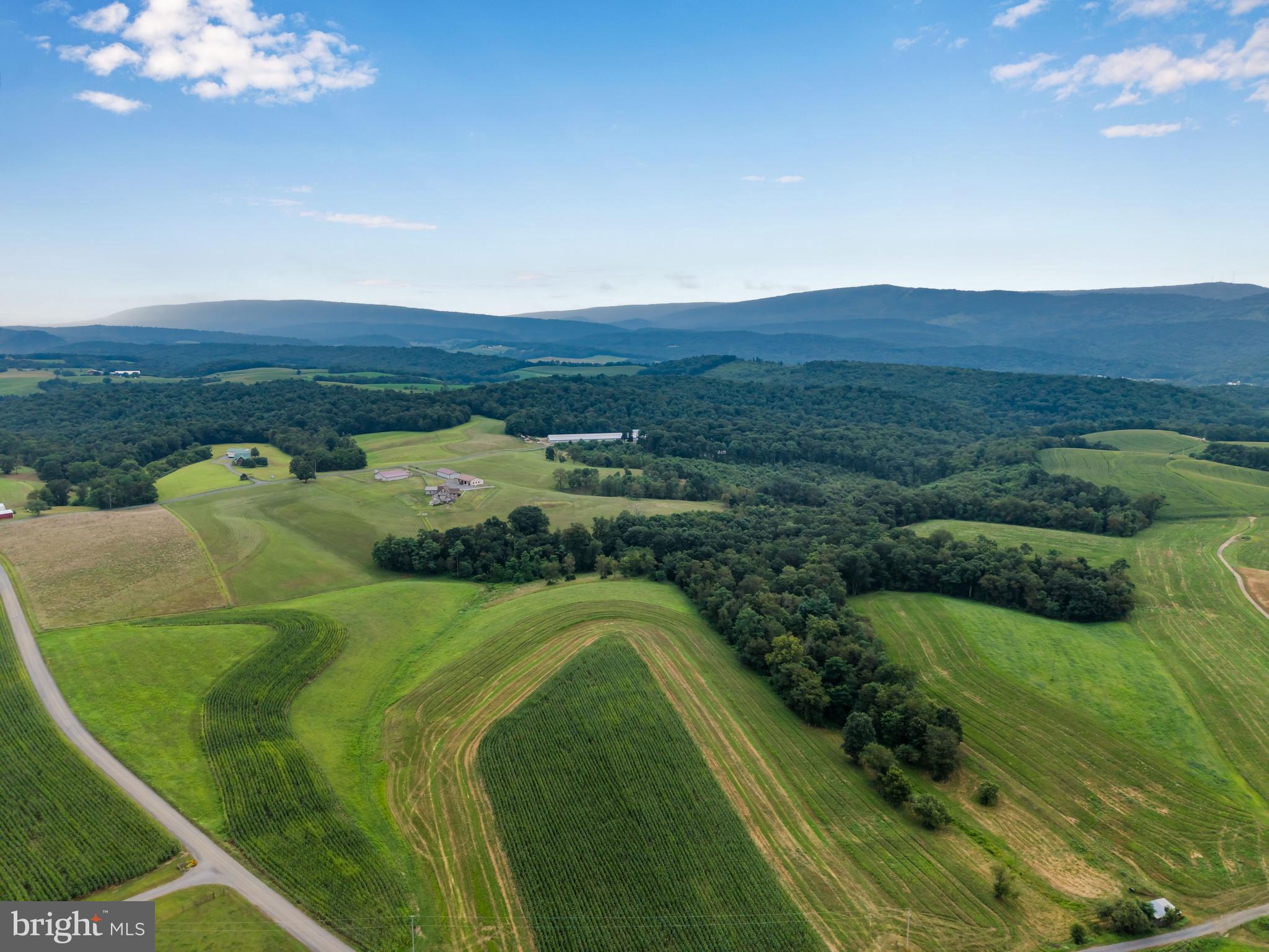 729 Gloss Road East Waterford, PA 17021 - Photo 5 of 70 a view of a golf course with a swimming pool