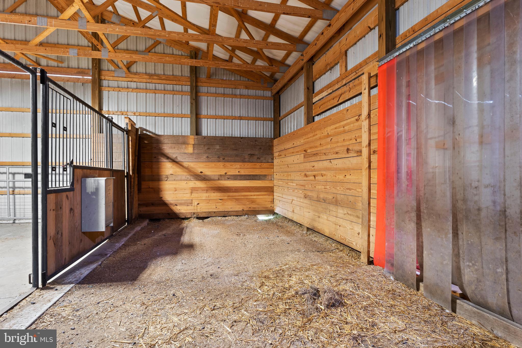 729 Gloss Road East Waterford, PA 17021 - Photo 61 of 70 a view of an empty room with wooden floor and fence