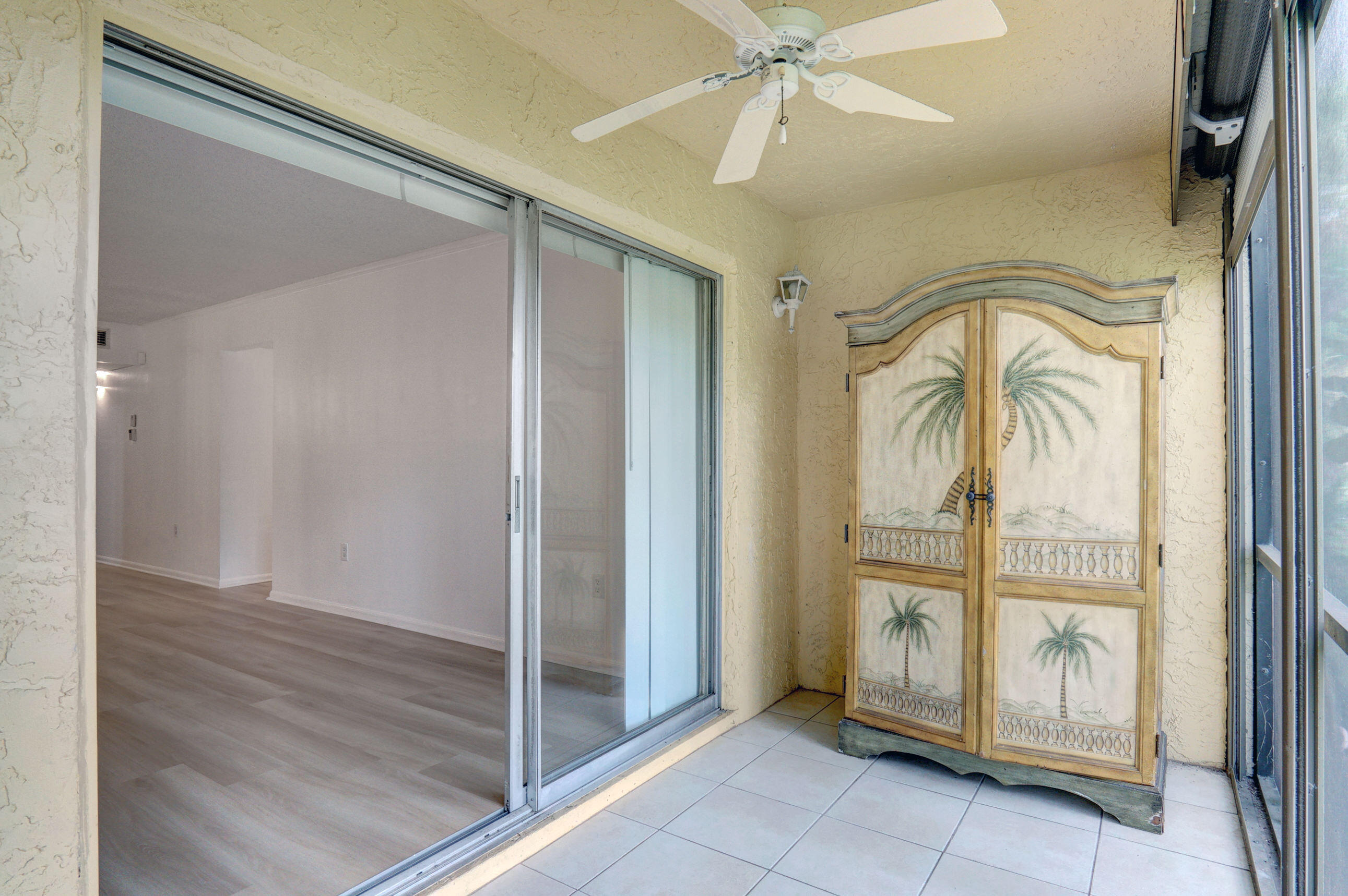 866 Southwest 9th St Circle, Unit 106 Boca Raton, FL 33486 - Photo 23 of 24 Glass Doors to Patio