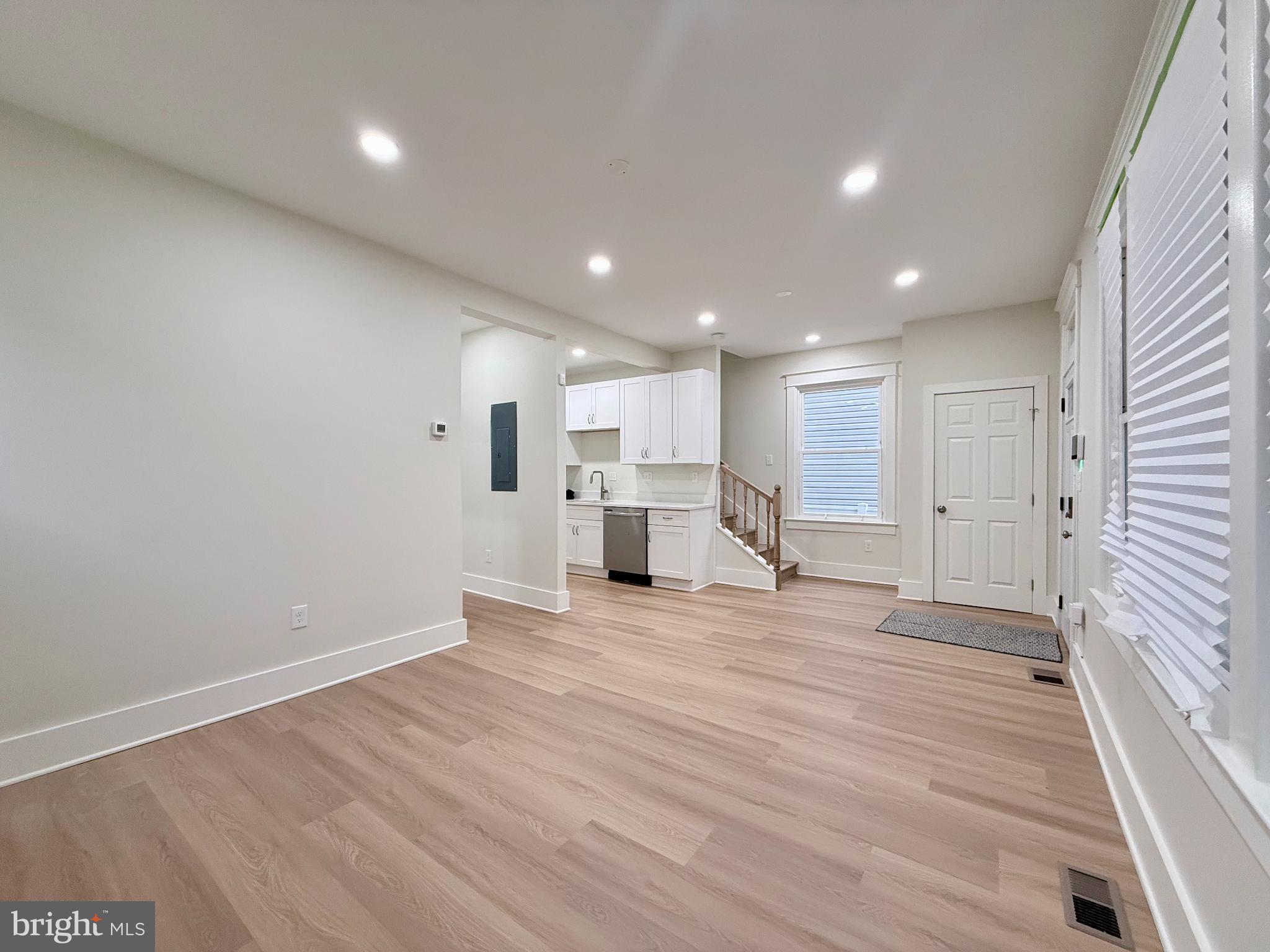 610 Raleigh Place Southeast Washington, DC 20032 - Photo 8 of 15 a view of empty room with wooden floor