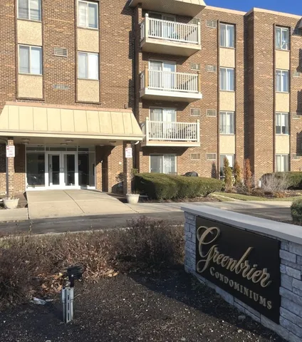 a front view of a building and a entrance