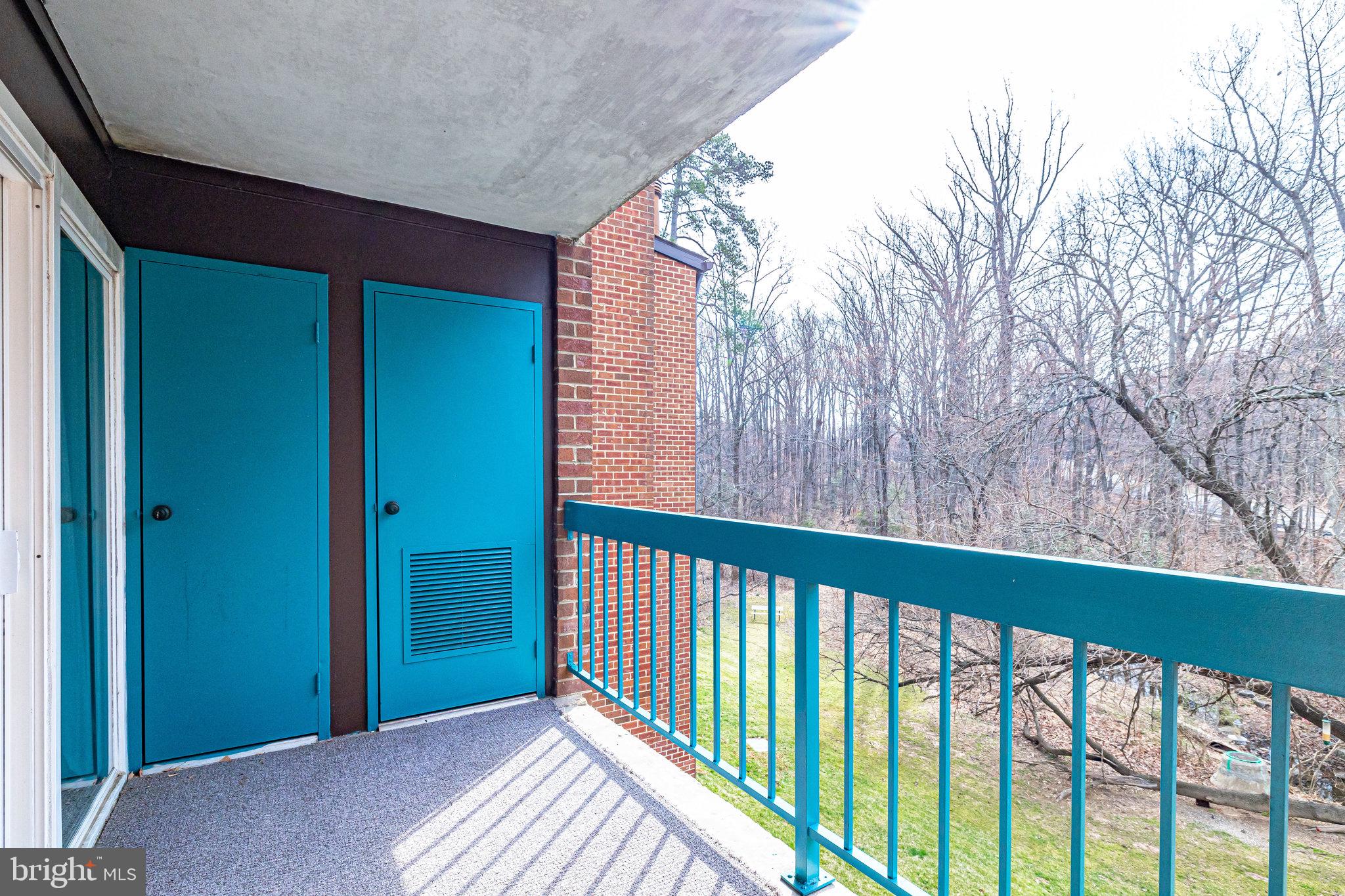 11843 Shire Court, Unit 22C Reston, VA 20191 - Photo 21 of 28 Private Balcony with Trees Behind