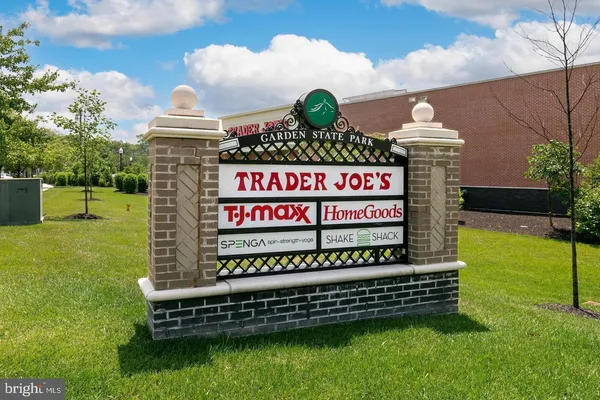 a view of a sign board with a park