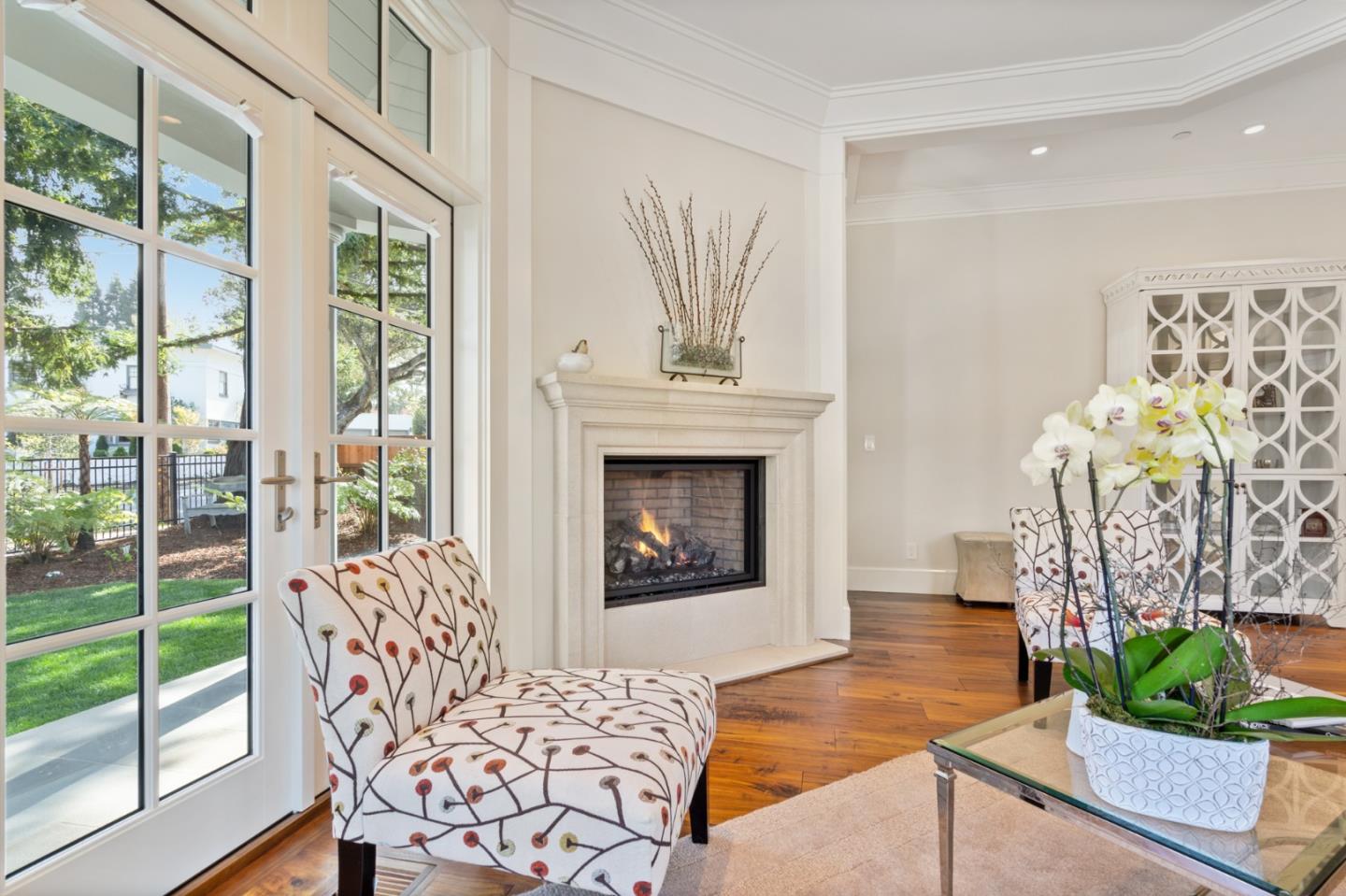 88 Warren Road San Mateo, CA 94401 - Photo 15 of 50 a living room with furniture and a fireplace