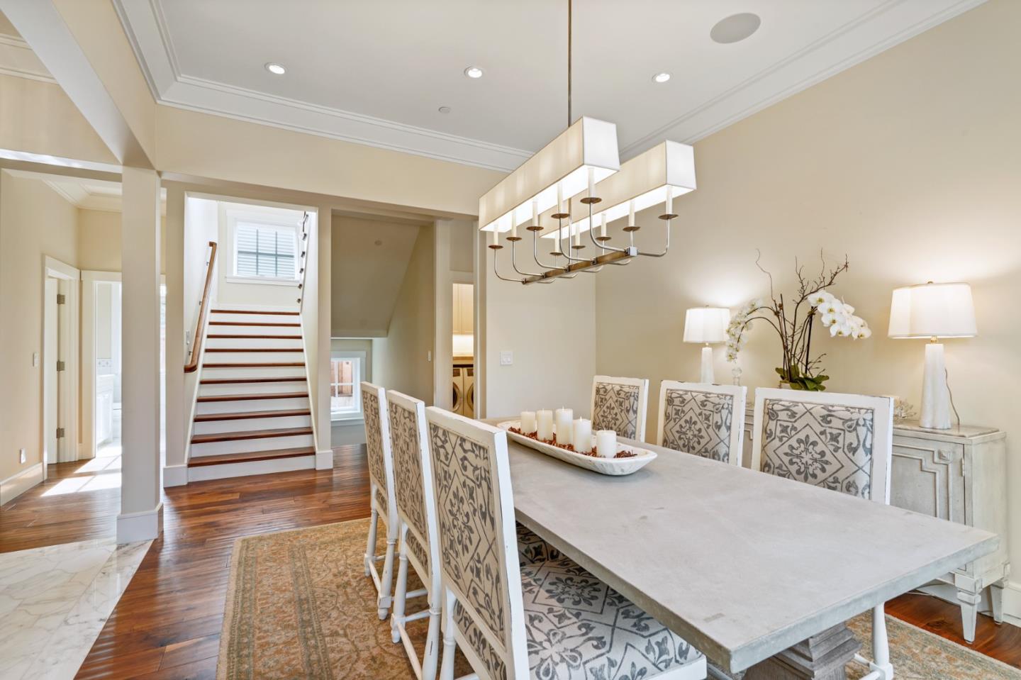 88 Warren Road San Mateo, CA 94401 - Photo 37 of 50 a view of a dining room with furniture and wooden floor