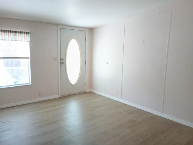 an empty room with windows