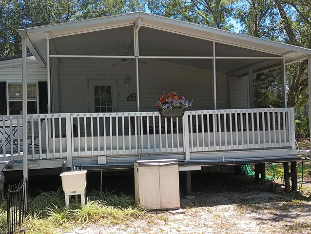 a deck of a house with a deck