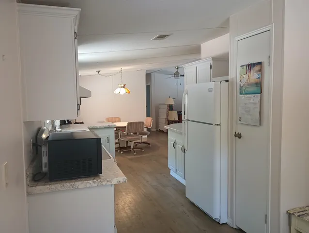 a view of living room and utility room