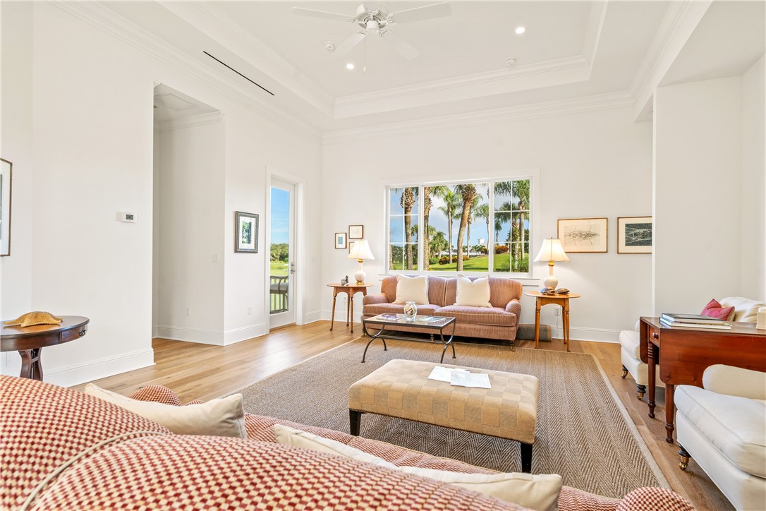 11 Caribe Way Vero Beach, FL 32963 - Photo 14 of 34 a living room with furniture and a rug