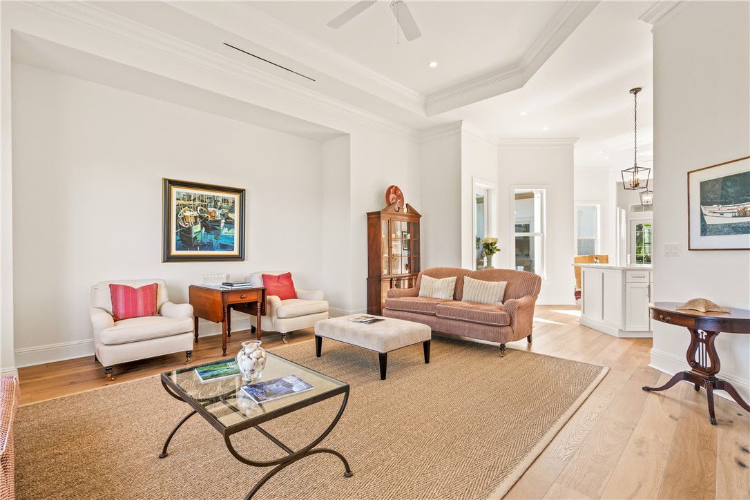 11 Caribe Way Vero Beach, FL 32963 - Photo 15 of 34 a living room with furniture and a table