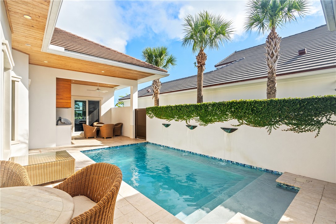 11 Caribe Way Vero Beach, FL 32963 - Photo 28 of 34 a view of a porch with seating area