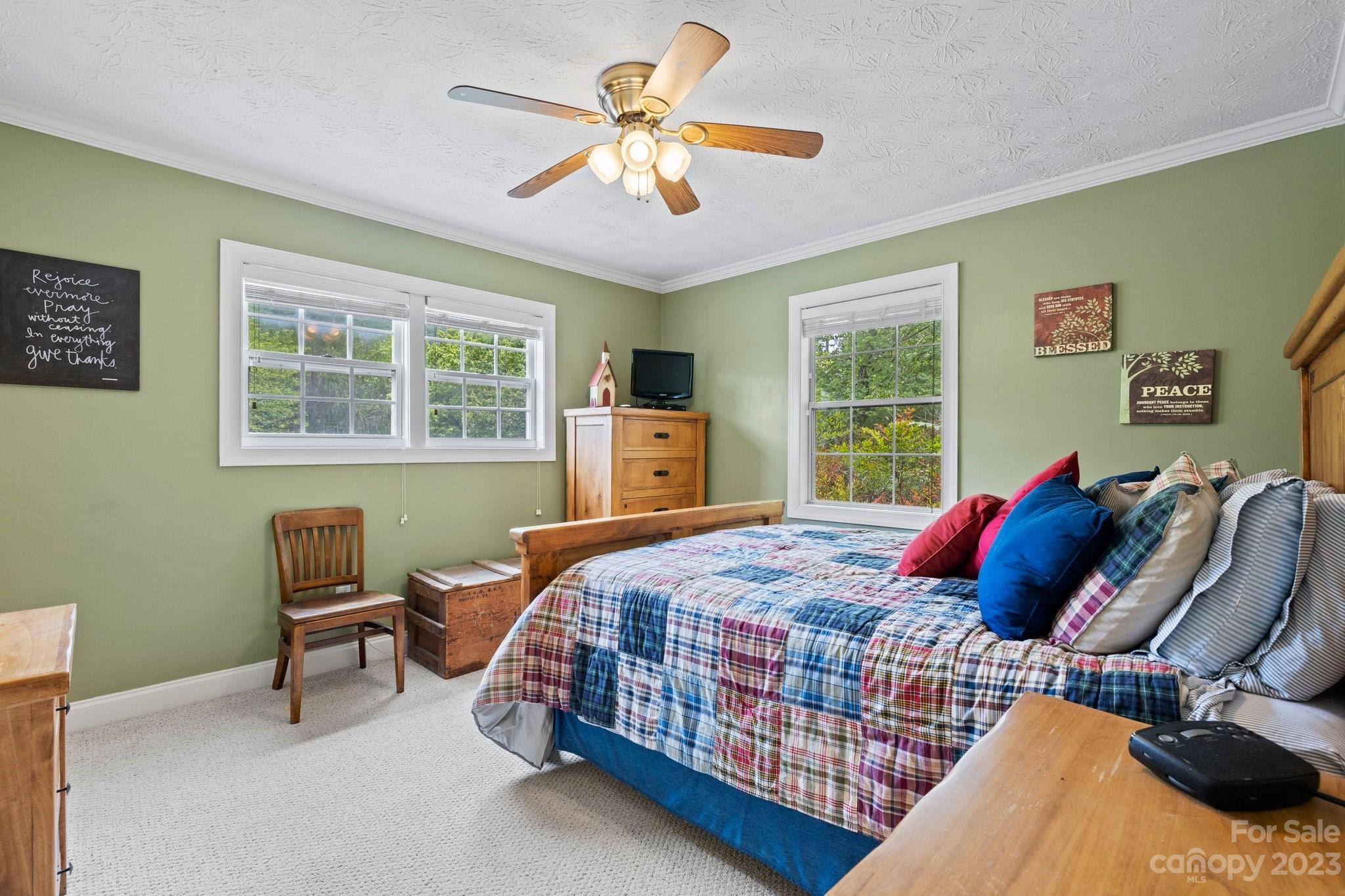 7 Quail Pointe Fletcher, NC 28732 - Photo 14 of 36 a bedroom with a bed and window