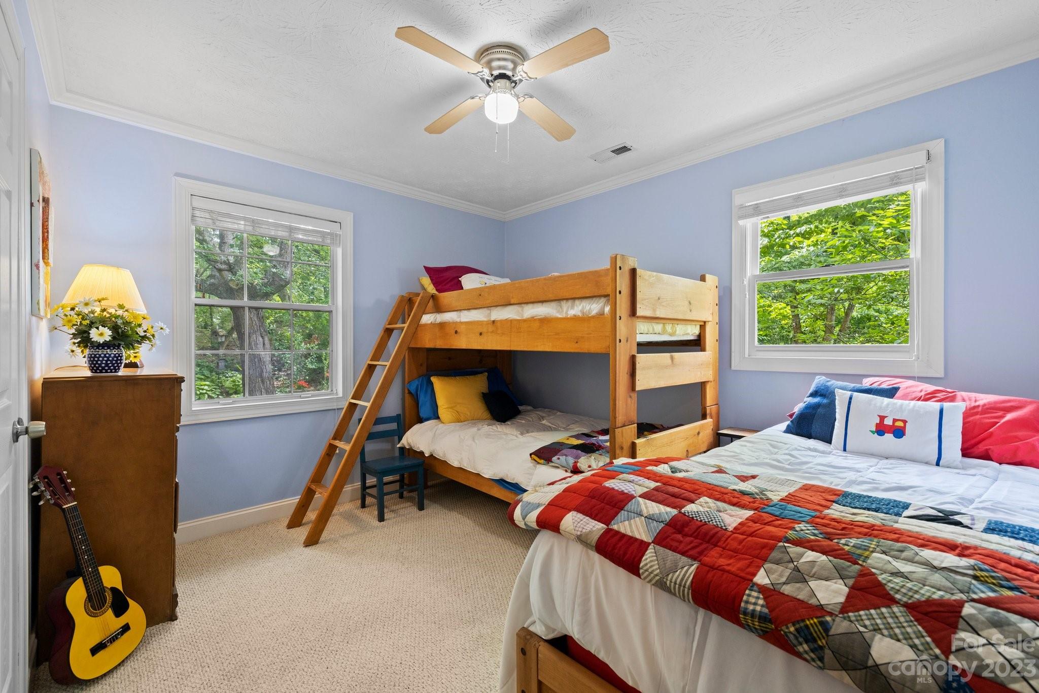 7 Quail Pointe Fletcher, NC 28732 - Photo 20 of 36 a bedroom with bed and window