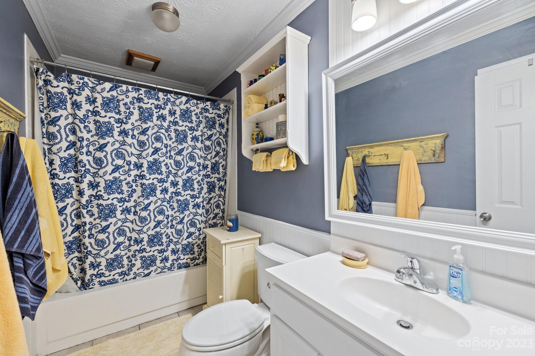7 Quail Pointe Fletcher, NC 28732 - Photo 21 of 36 a bathroom with a sink mirror vanity and toilet
