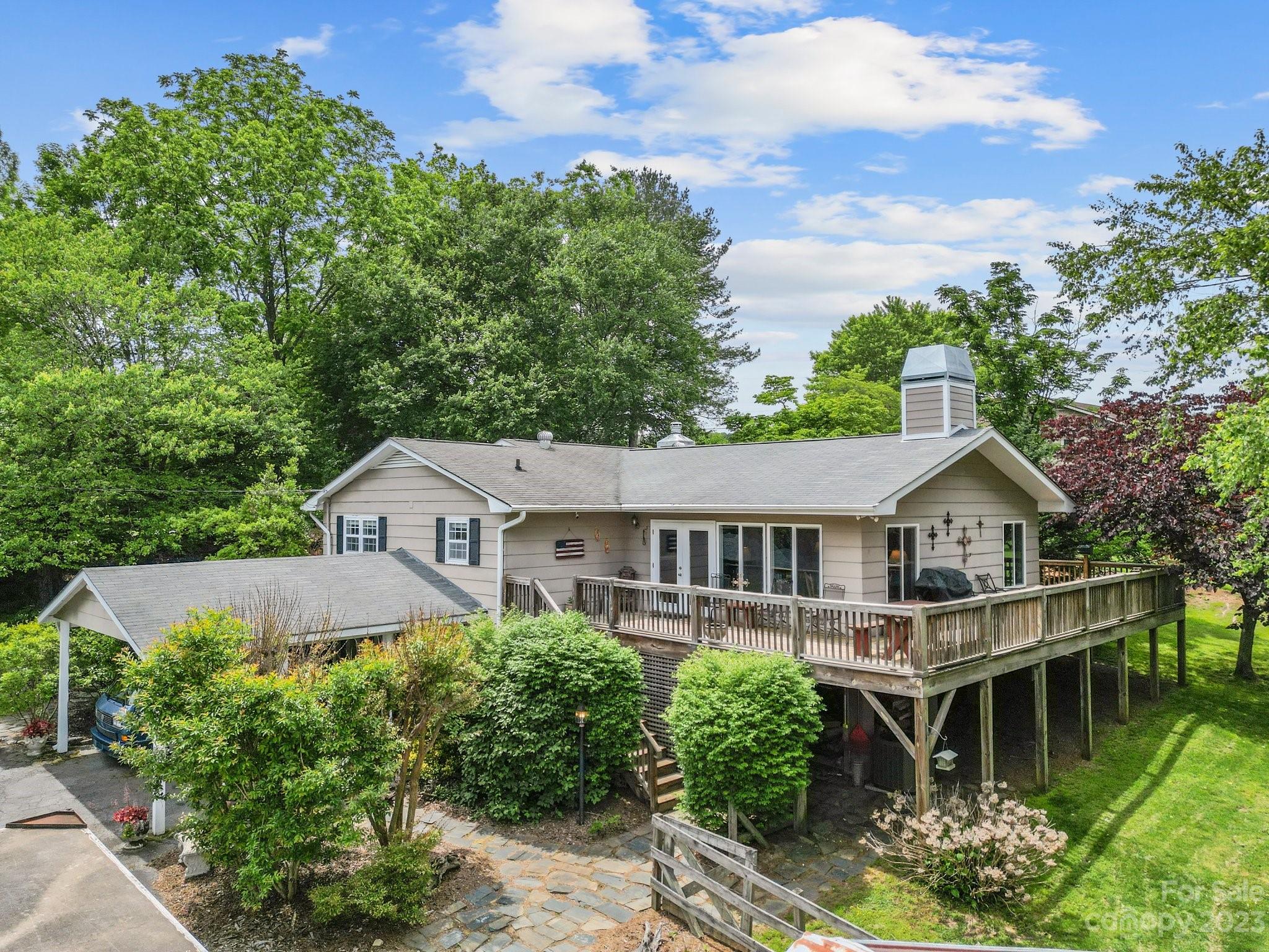 7 Quail Pointe Fletcher, NC 28732 - Photo 34 of 36 an aerial view of a house with a big yard and potted plants in front of it