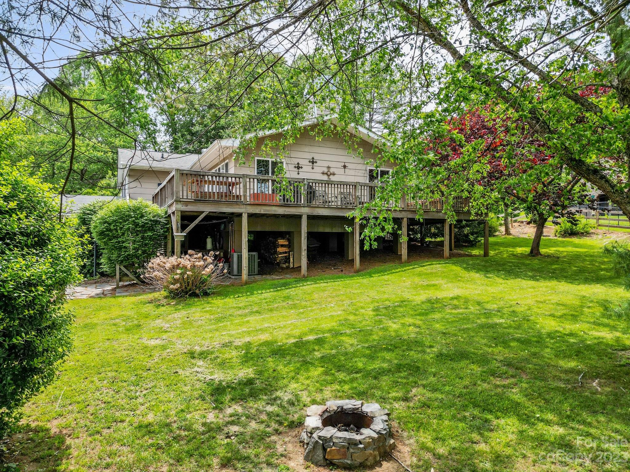 7 Quail Pointe Fletcher, NC 28732 - Photo 35 of 36 a view of a house with a yard and sitting area