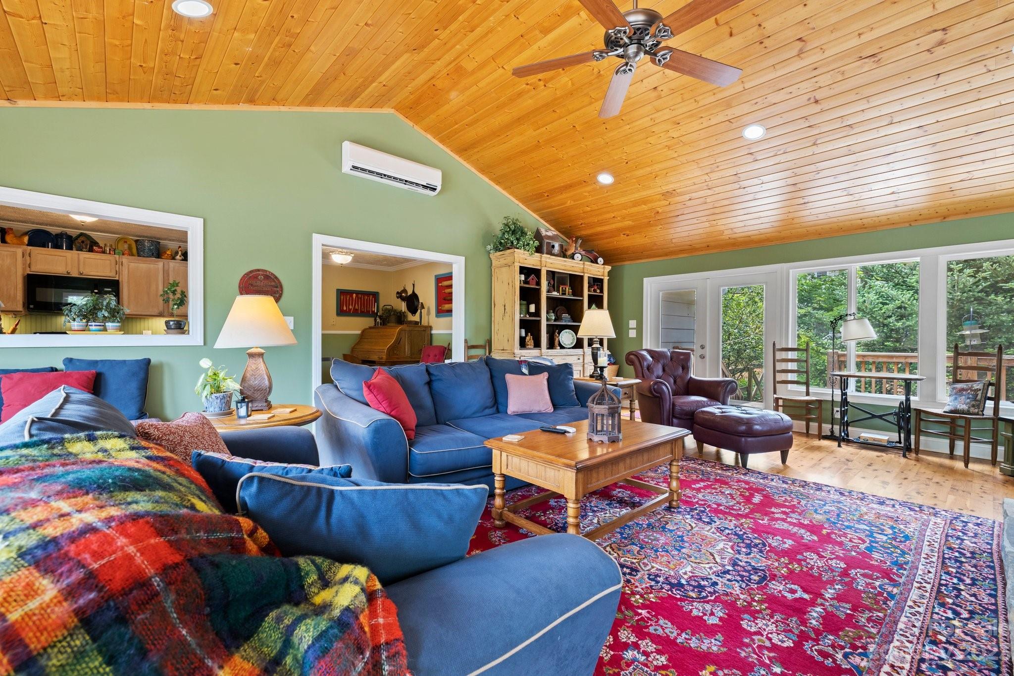 7 Quail Pointe Fletcher, NC 28732 - Photo 7 of 36 a living room with furniture fireplace and a large window