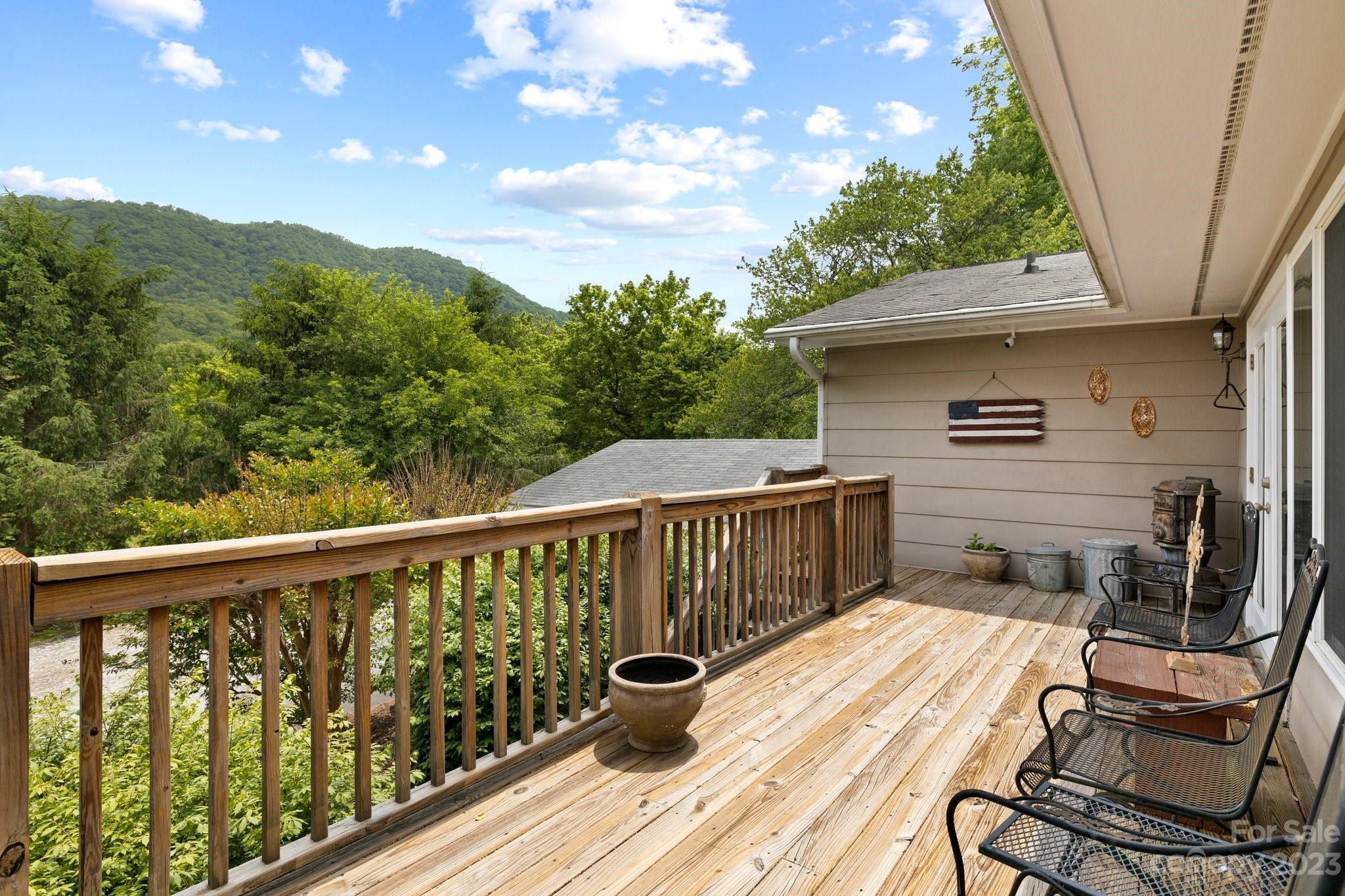7 Quail Pointe Fletcher, NC 28732 - Photo 8 of 36 a view of balcony with wooden floor and outdoor seating