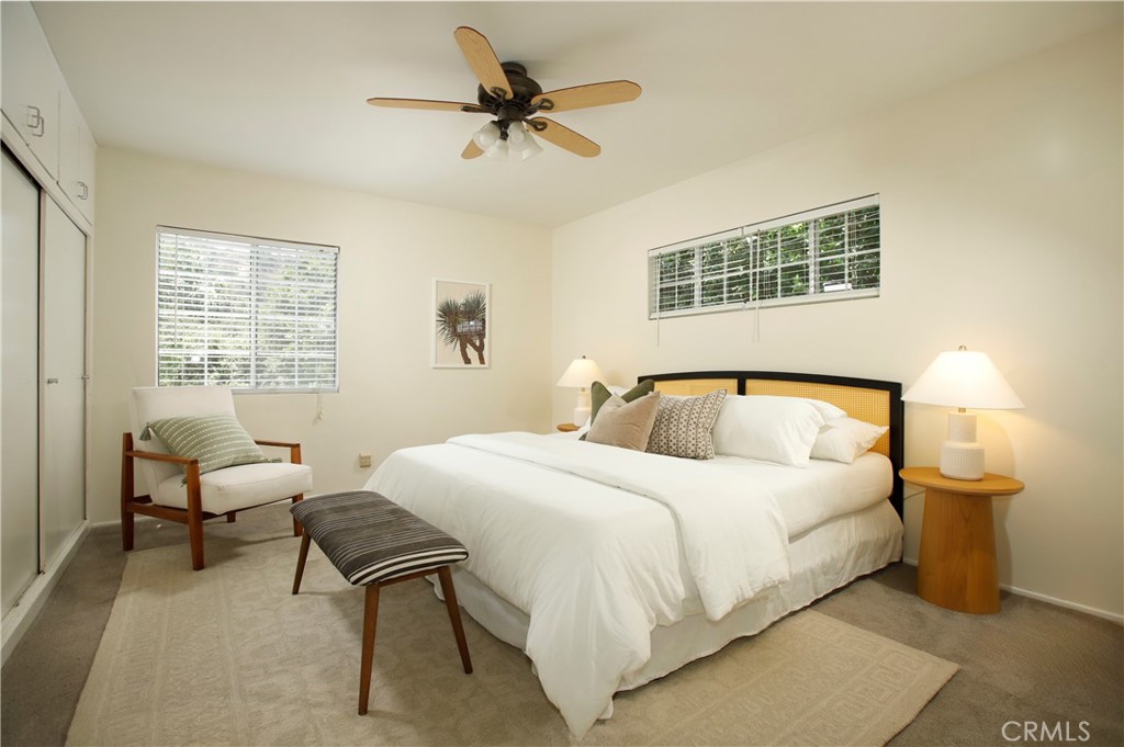 1852 Alpha Road Glendale, CA 91208 - Photo 2 of 28 a bedroom with a bed and wooden floor
