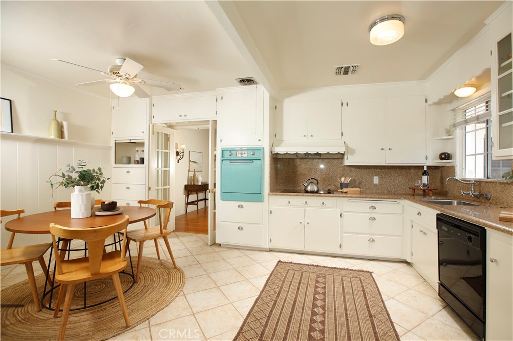 1852 Alpha Road Glendale, CA 91208 - Photo 3 of 28 a kitchen with stainless steel appliances kitchen island granite countertop a sink and cabinets