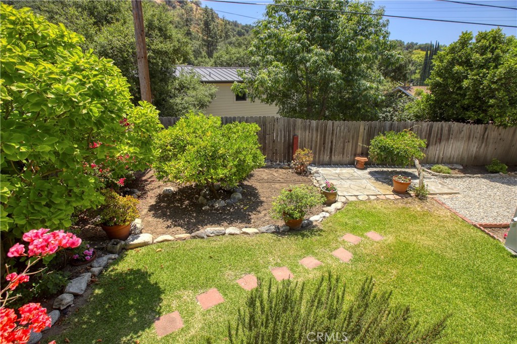 1852 Alpha Road Glendale, CA 91208 - Photo 4 of 28 a backyard of a house with a yard and outdoor seating