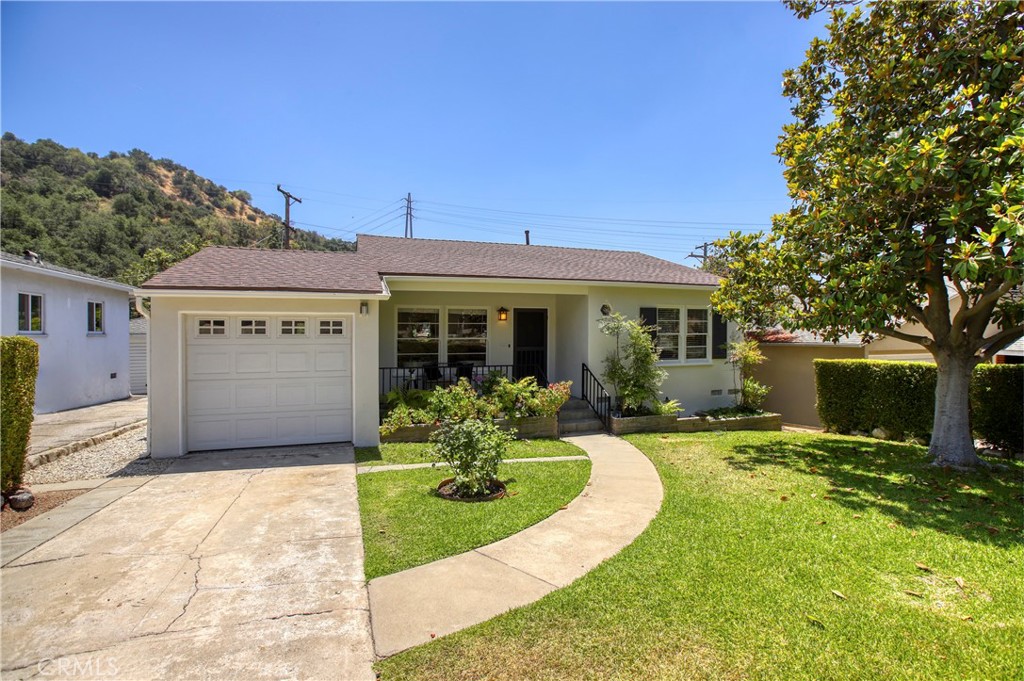 1852 Alpha Road Glendale, CA 91208 - Photo 6 of 28 front view of a house with a yard