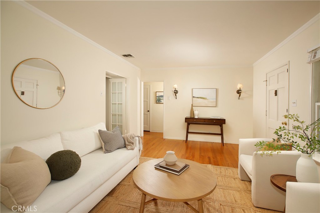 1852 Alpha Road Glendale, CA 91208 - Photo 8 of 28 a living room with furniture and a potted plant