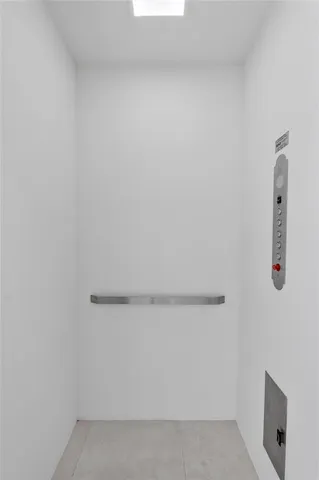 a kitchen with stainless steel appliances a refrigerator and a stove top oven