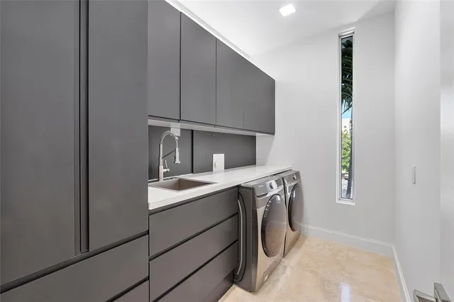 an empty room with closet and windows