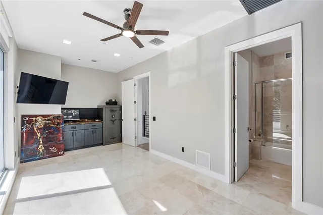 a view of a livingroom with a flat screen tv