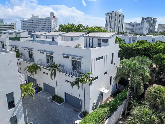 a view of a balcony with chairs