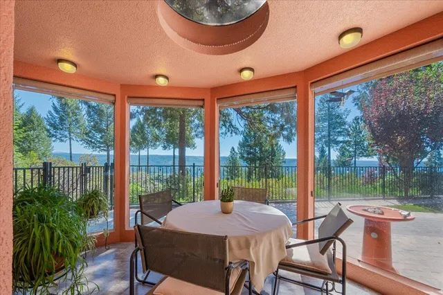 a bedroom with furniture and a rug