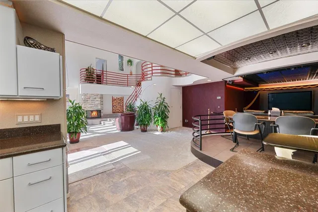 a bedroom with a bed and a desk