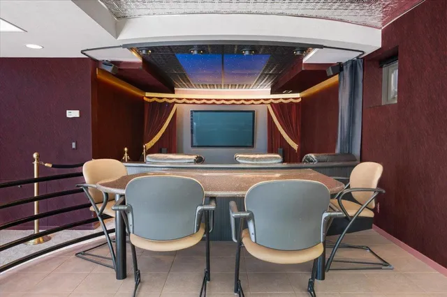 a view of living room with furniture and rug