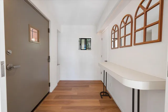 a view of a balcony with a flat screen tv