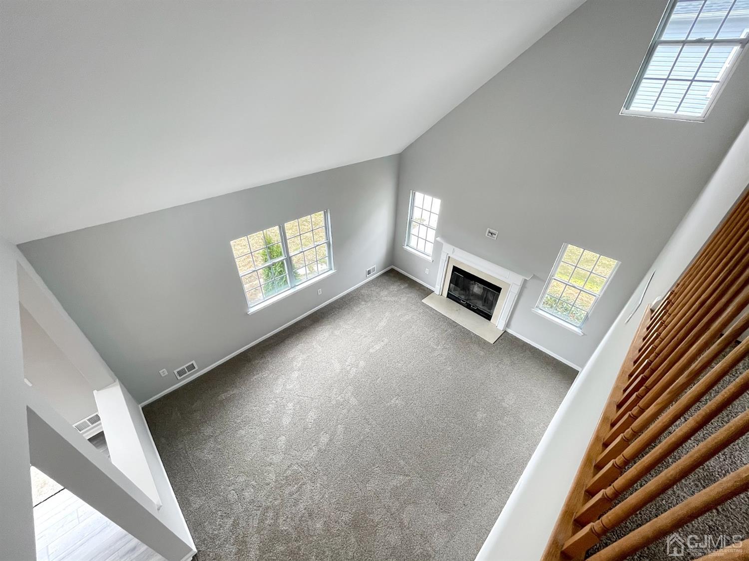 1 Cannon Road Old Bridge, NJ 08857 - Photo 12 of 23 a view of an empty room with a fireplace and a window