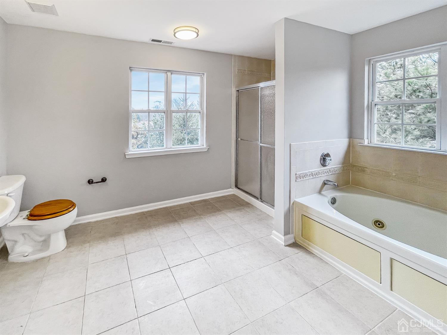 1 Cannon Road Old Bridge, NJ 08857 - Photo 19 of 23 a bathroom with a bathtub and a window