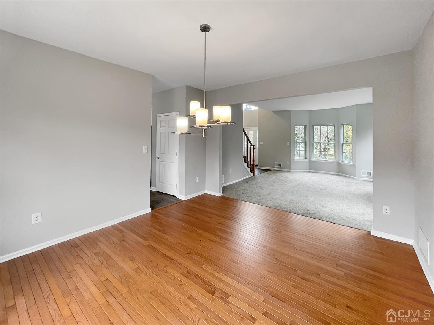 1 Cannon Road Old Bridge, NJ 08857 - Photo 10 of 23 a view of a kitchen with a dishwasher cabinets and wooden floor