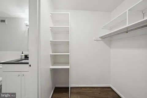 a view of an empty walk in closet