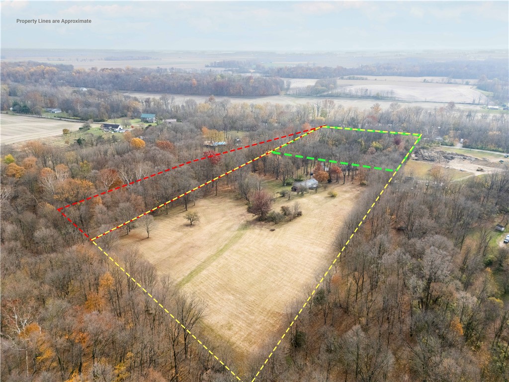 18333 Lefevre Number 2 Road Sidney, OH 45365 - Photo 15 of 25 Expansive acreage surrounded by mature trees offers an idyllic retreat with vast open spaces.