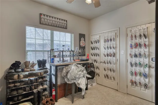 a view of a room with racks on the wall