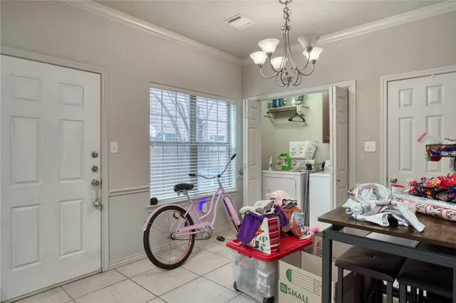 a very nice looking bedroom with a window