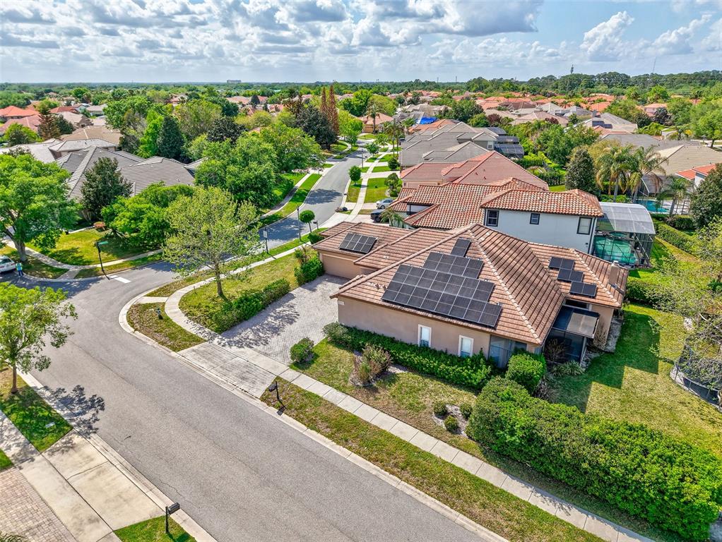 918 Algare Loop Windermere, FL 34786 - Photo 63 of 73 an aerial view of a house with a garden and plants